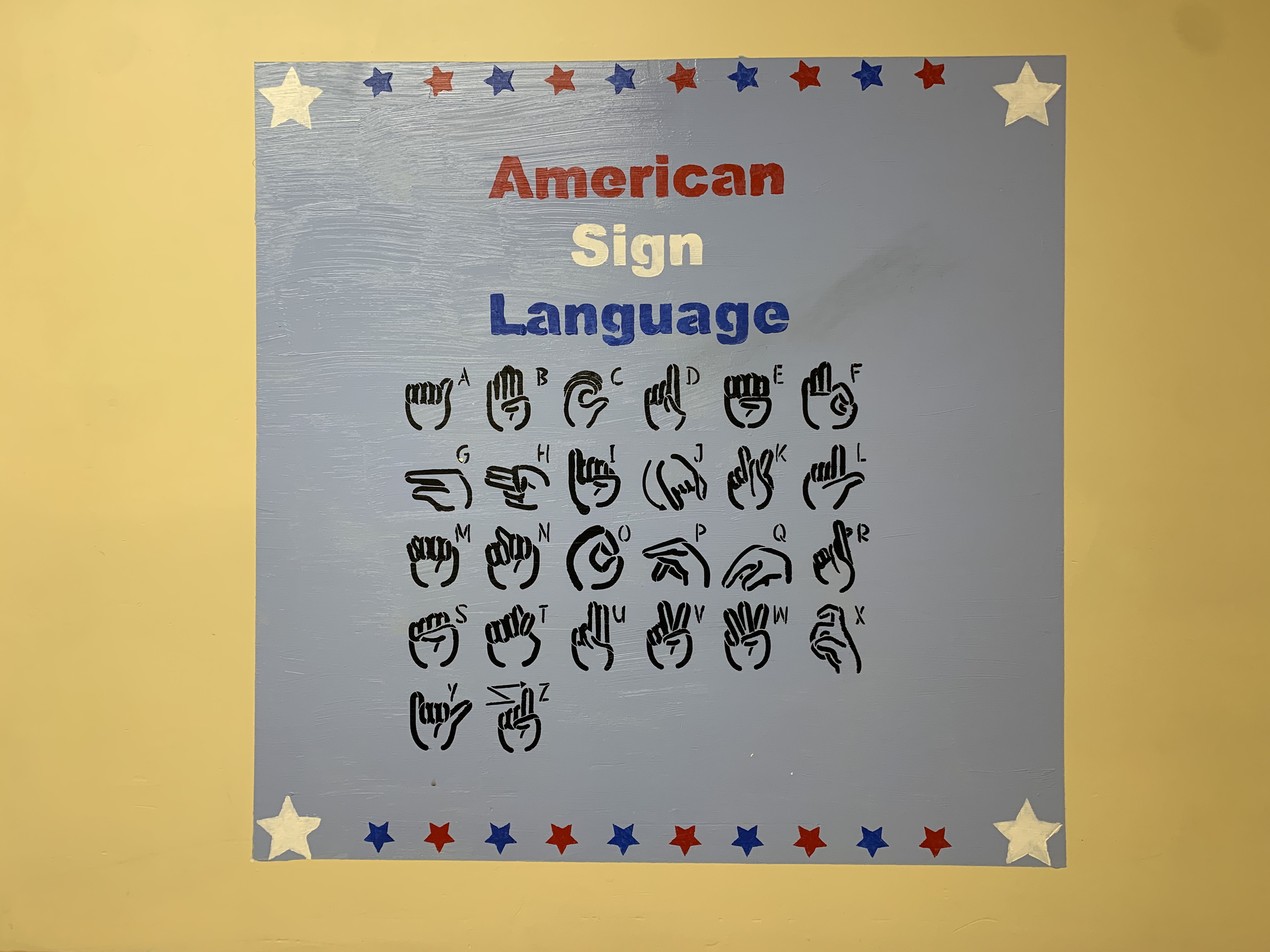 hand-painted American Sign Language wall mural by Choonie