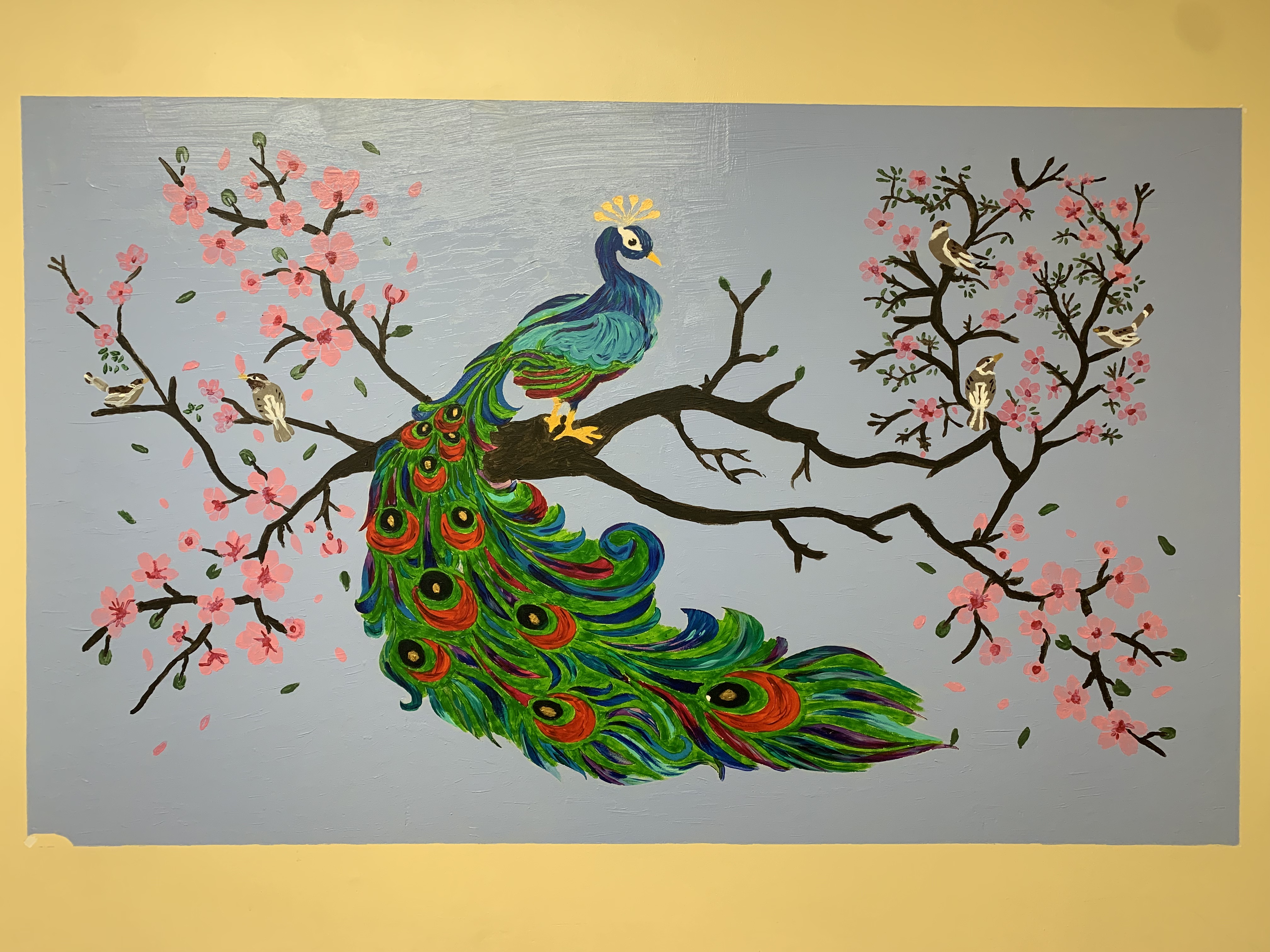 hand-painted peacock mural by Choonie