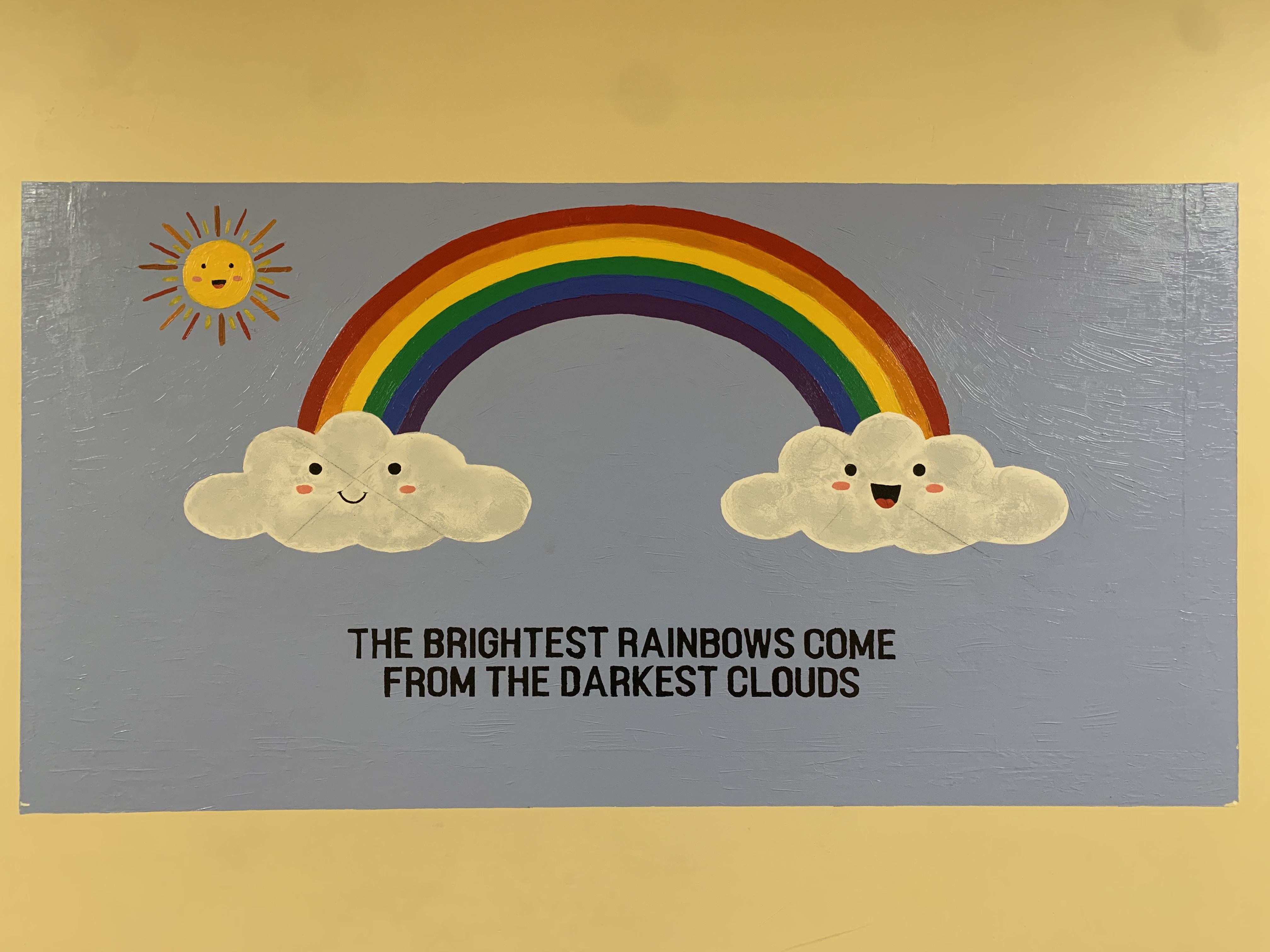 hand-painted rainbow wall mural by Choonie