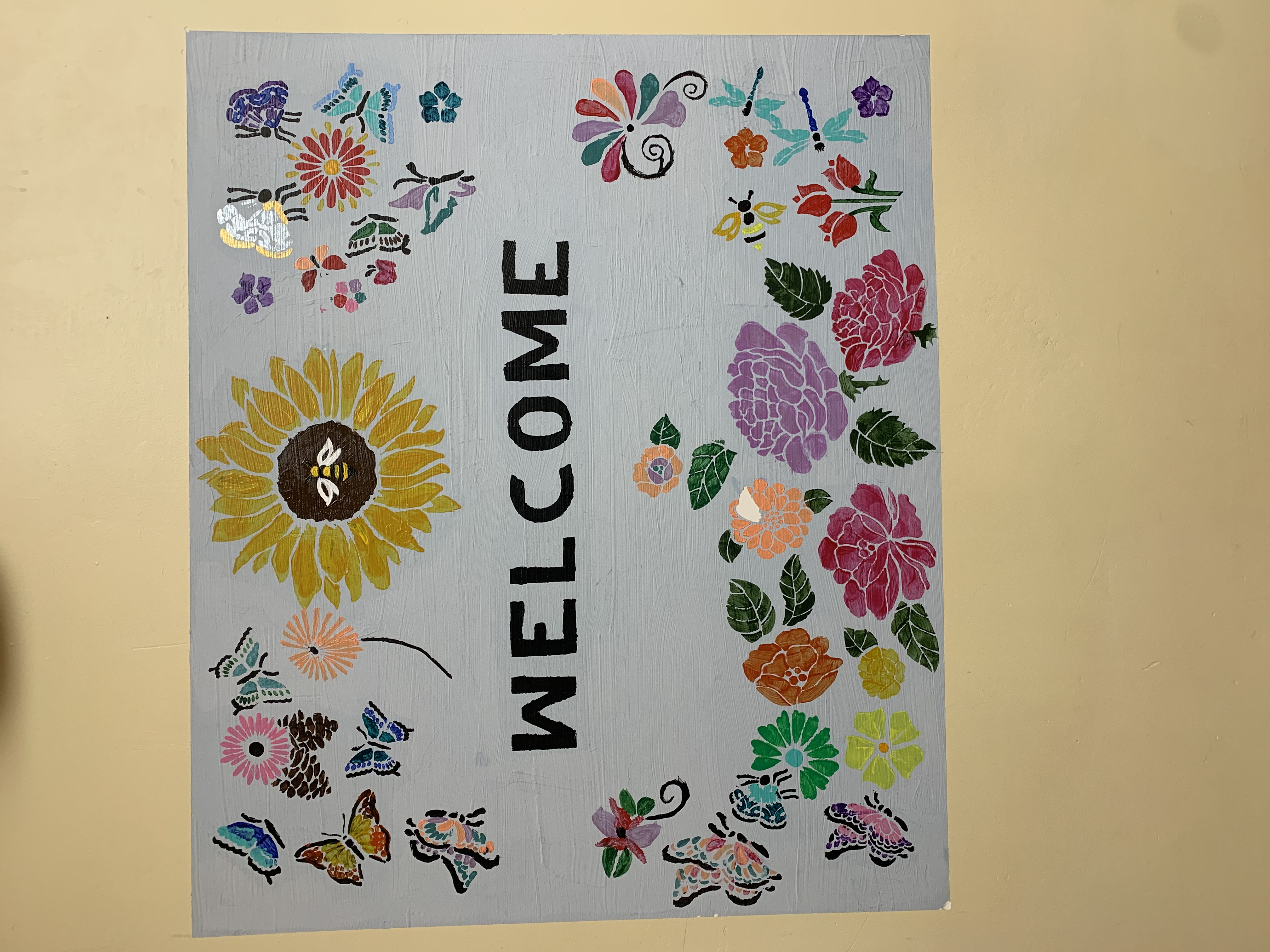 hand-painted welcome wall mural by Choonie
