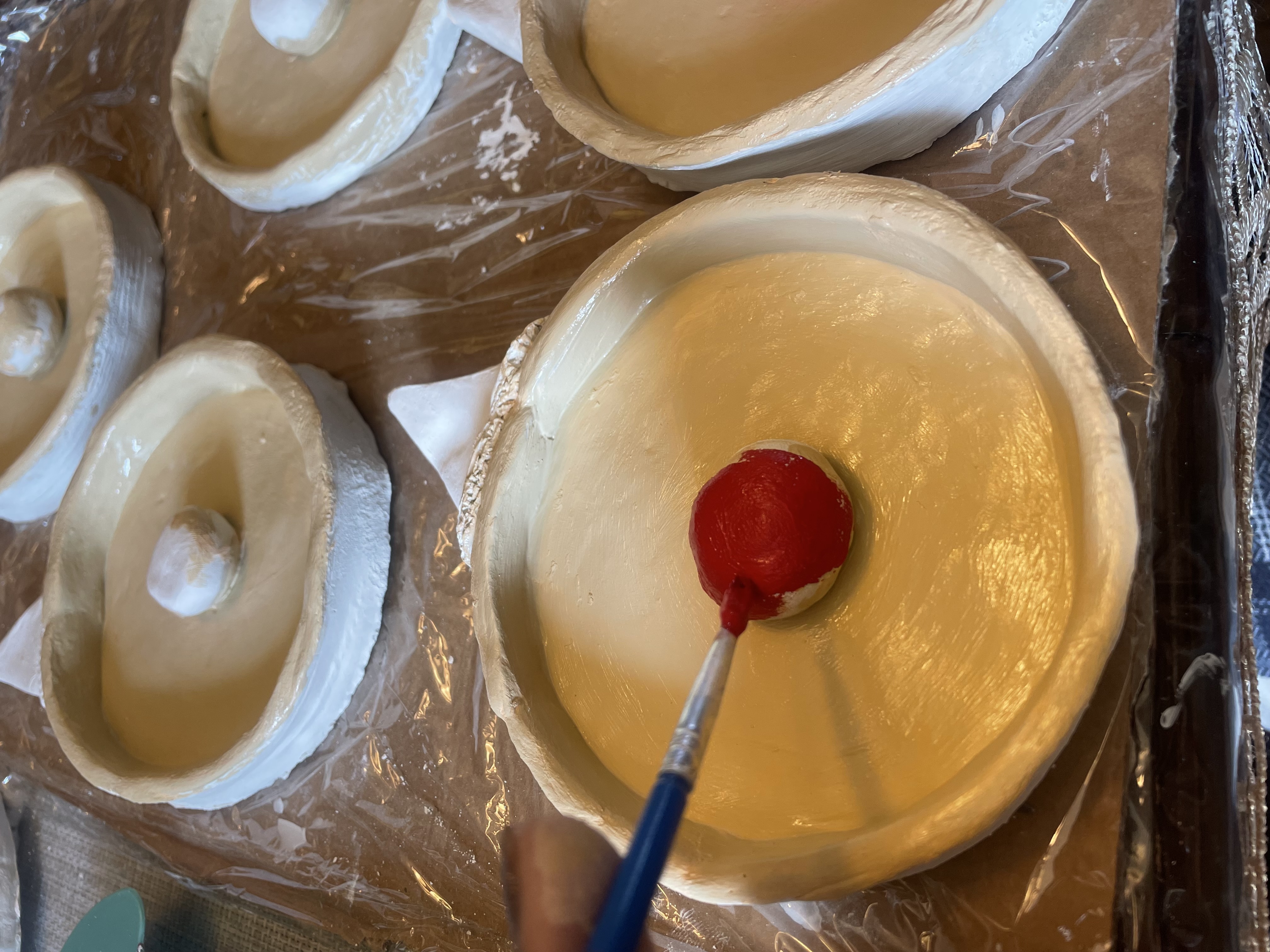 Painting the clown noses